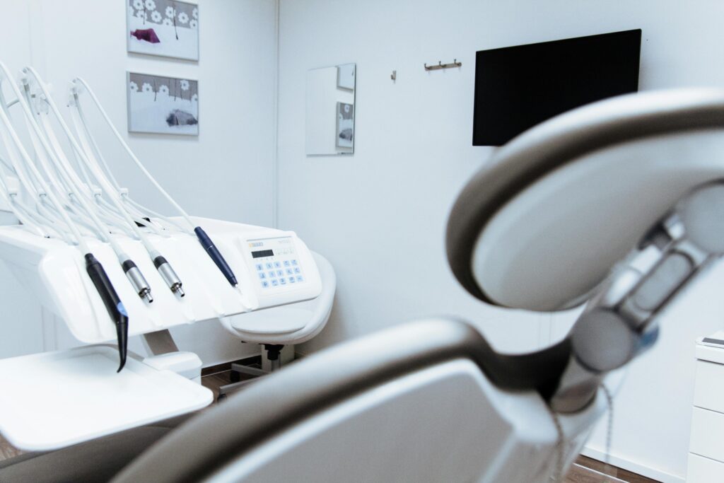 Bright dental office showcasing modern equipment and clean, sleek design.